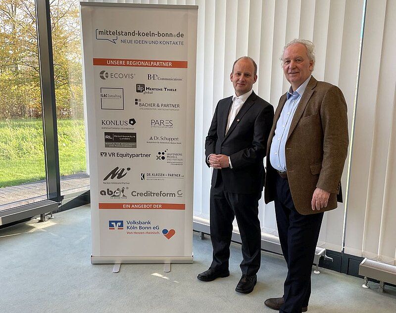 Oliver Keyser (Abteilungsleitung Firmenkunden-Center Bonn der Volksbank Köln Bonn) und Christoph Hillebrand (Nacken Hillebrand Partner GmbH)